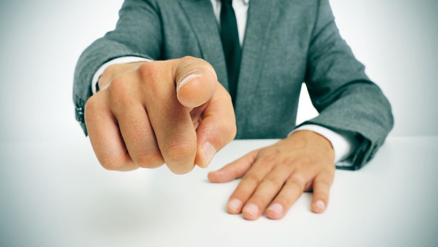 Bigstock Man Wearing A Suit Sitting In 50343593